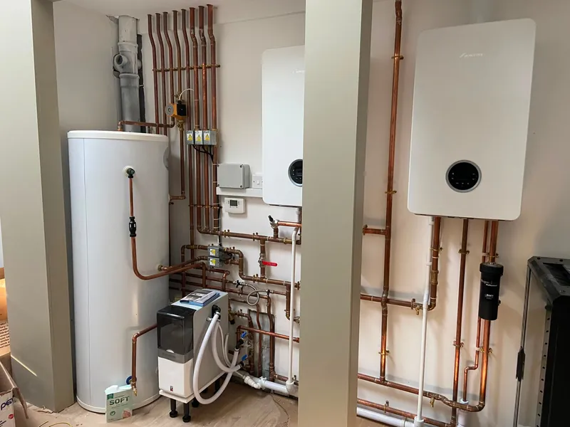 Twin Worcester boilers with hot water cylinder and pipework