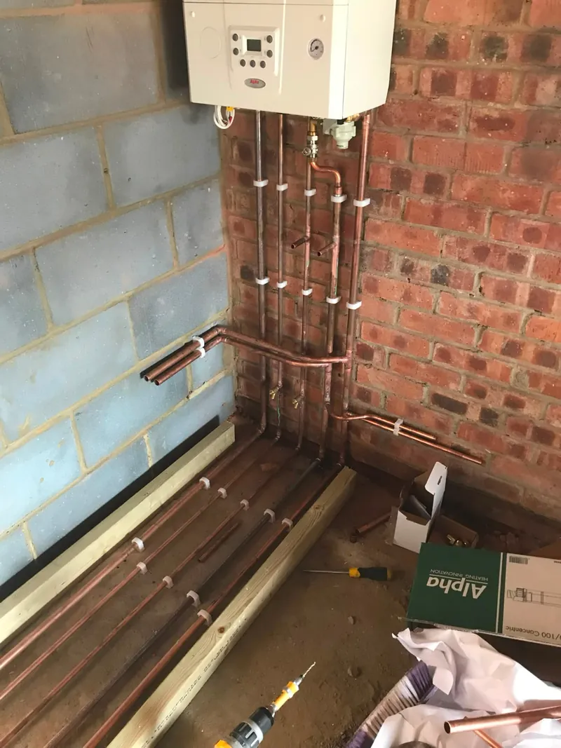 Alpha combi boiler installed with neat copper pipework